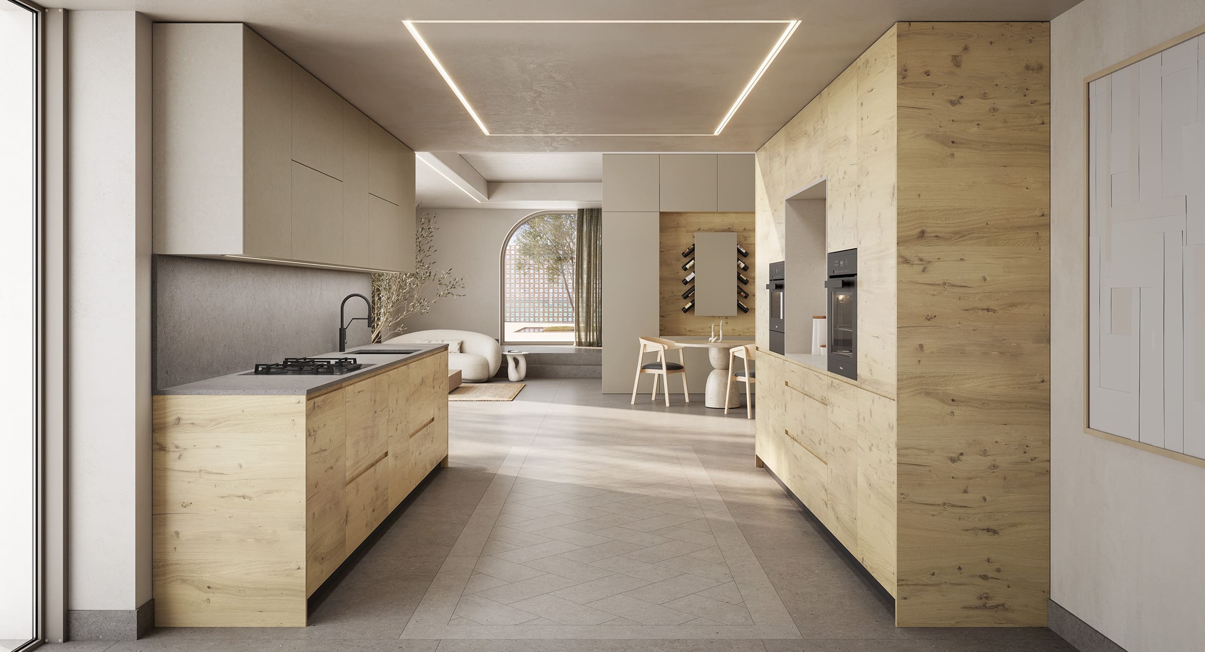 Cocina amplia de estilo moderno con frentes en madera clara y beige, disposición paralela y hornos integrados.