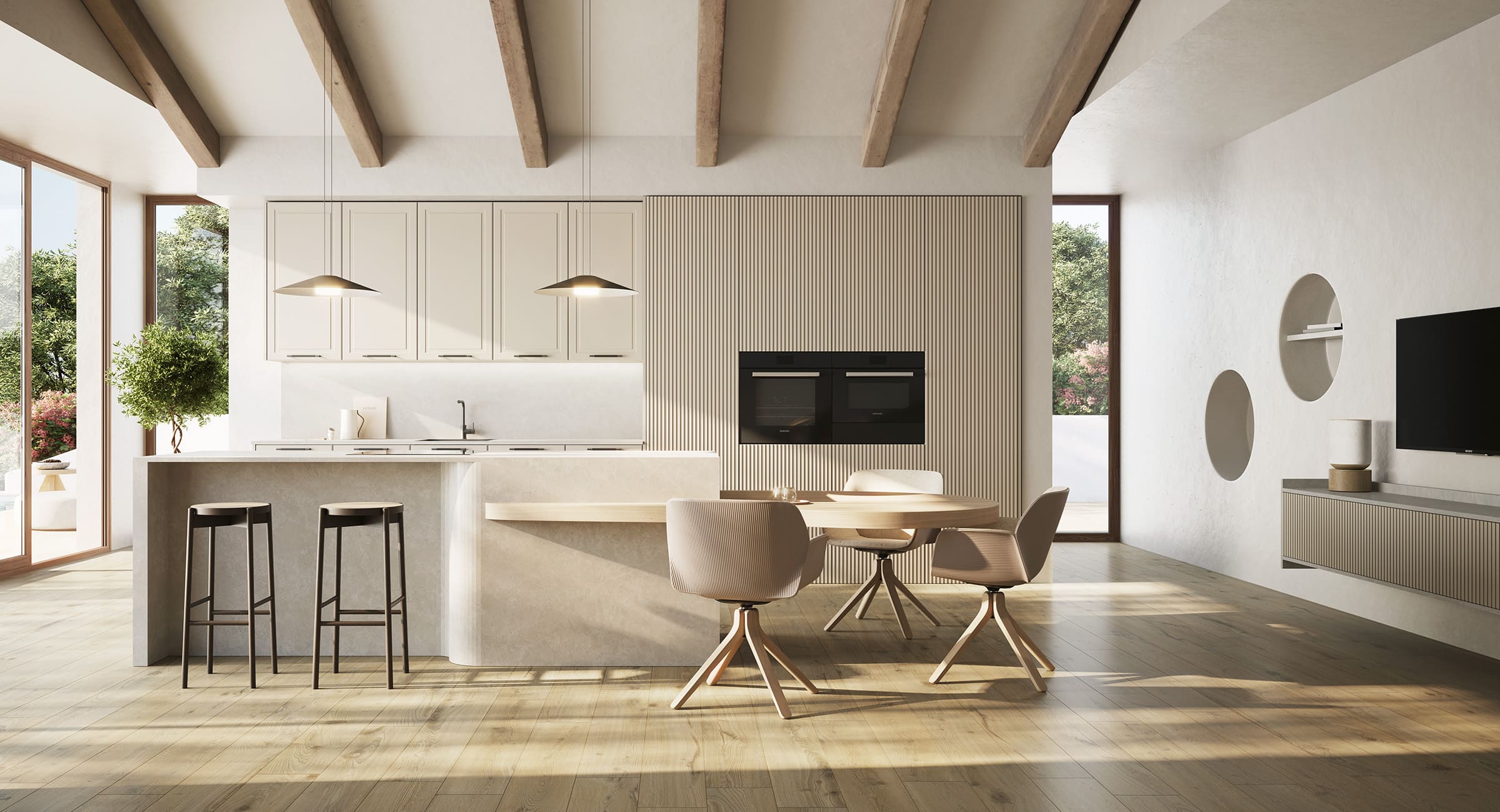 Cocina moderna abierta en tonos beige y madera clara con isla, horno en columna y mesa redonda con sillas.